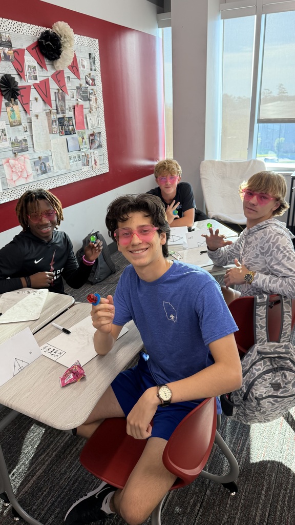 Students in rose colored heart glasses