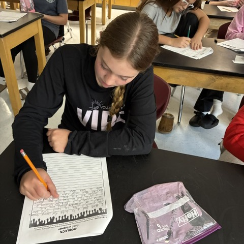 student completing oobleck lab