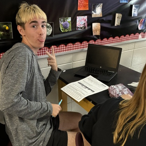 student completing oobleck lab