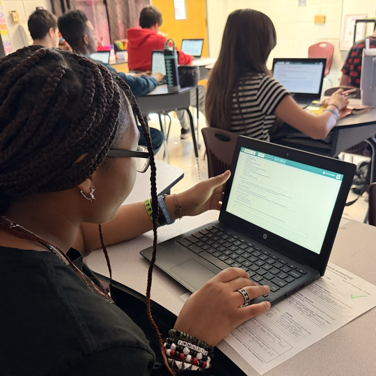 students typing narratives