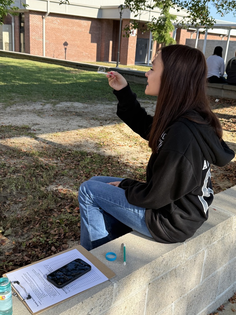 Student taking care of her bubble