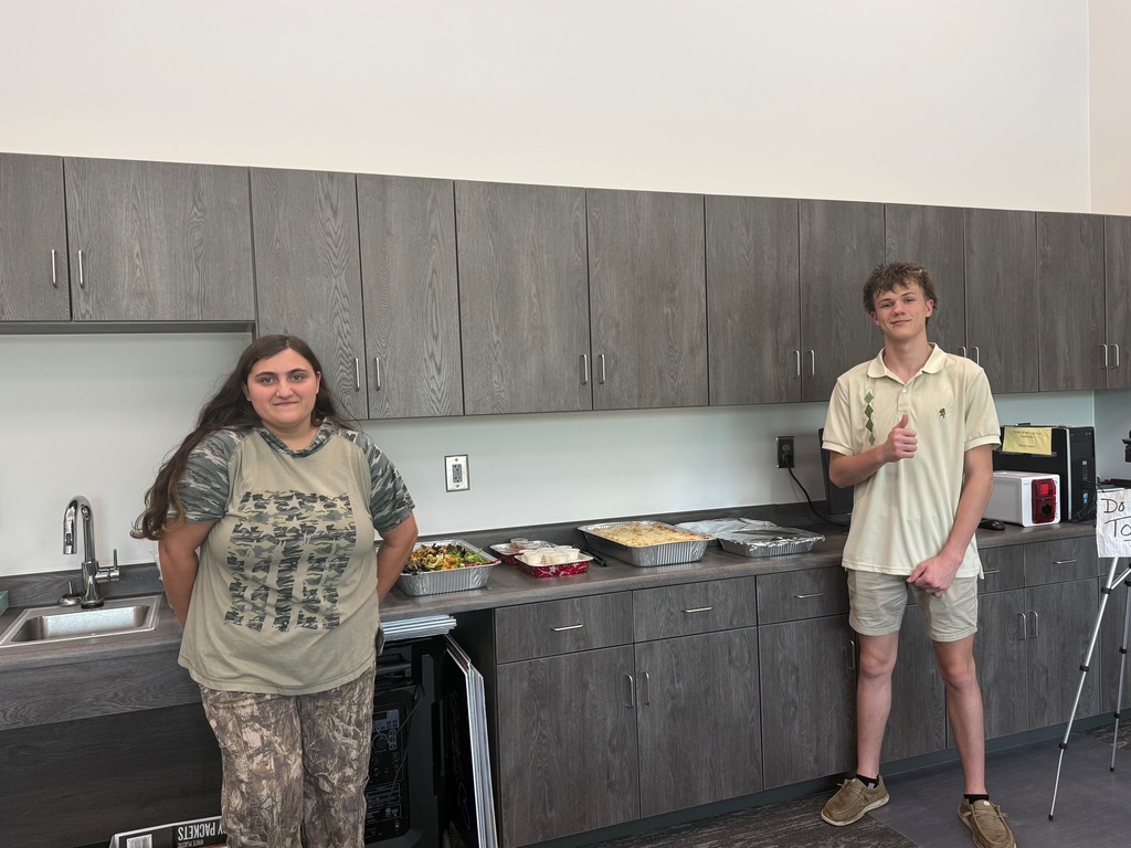 Culinary students serving 
