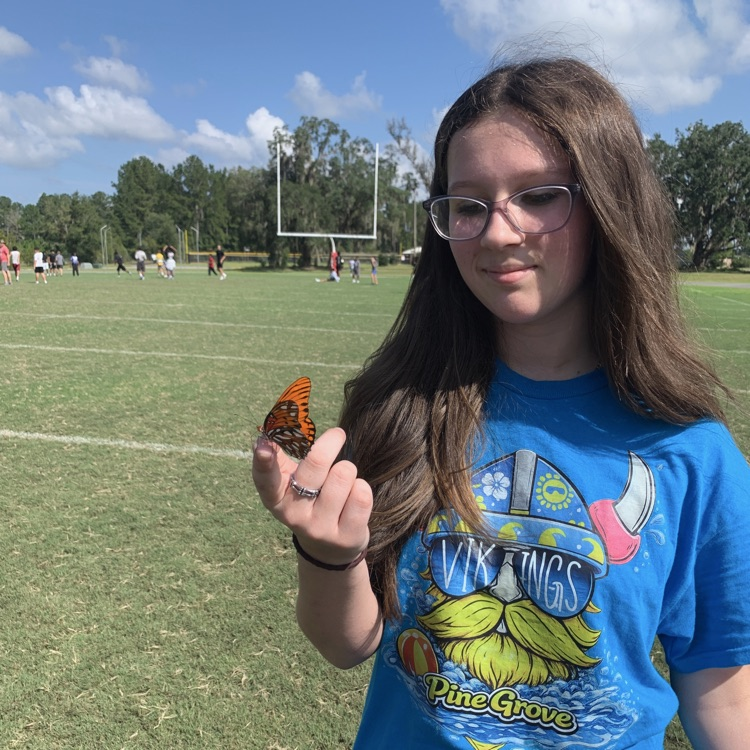 evie holding a butterfly