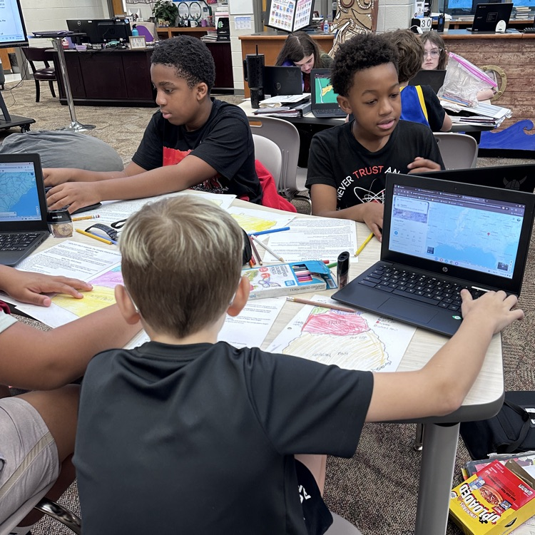 students working in media center