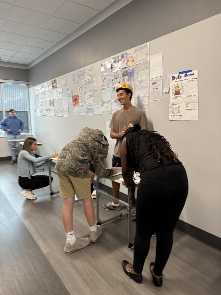 Students exploring the Shakespeare' Twelfth Night characters with museum exhibits.