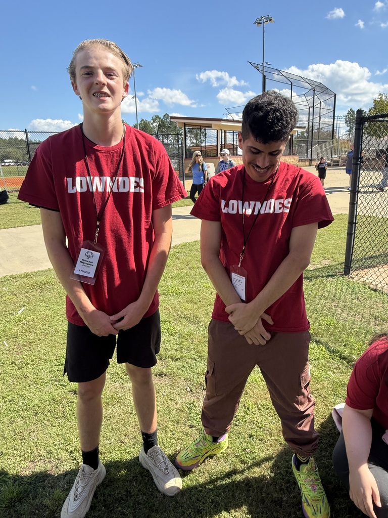 2 of our athletes in their Lowndes shirts
