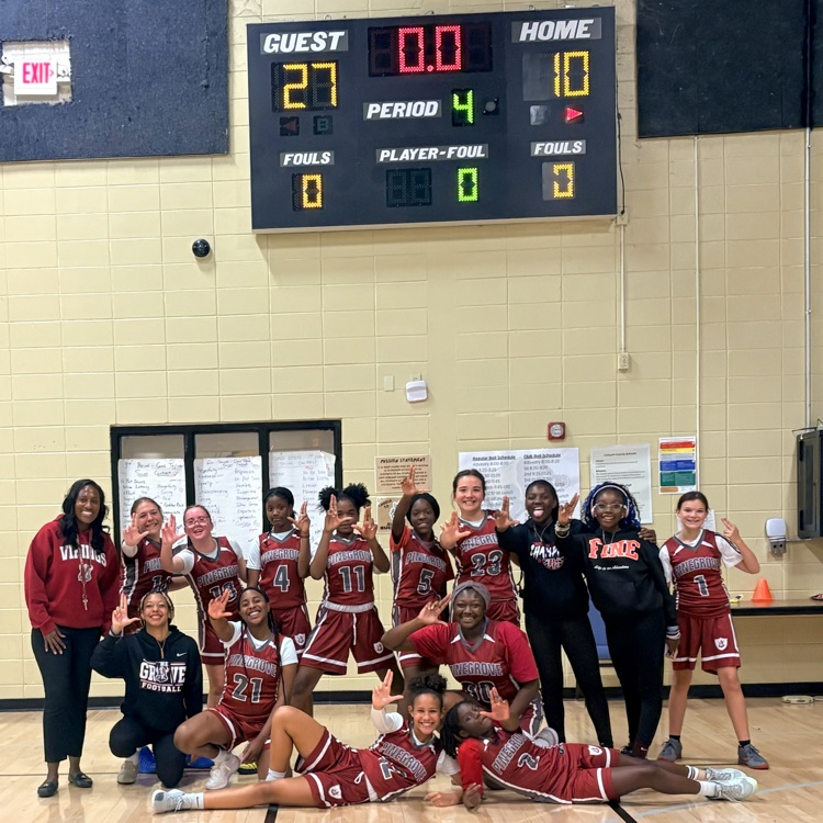 basketball team celebrating after win 