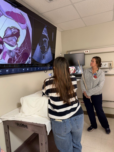 Students observing the use of medical technology