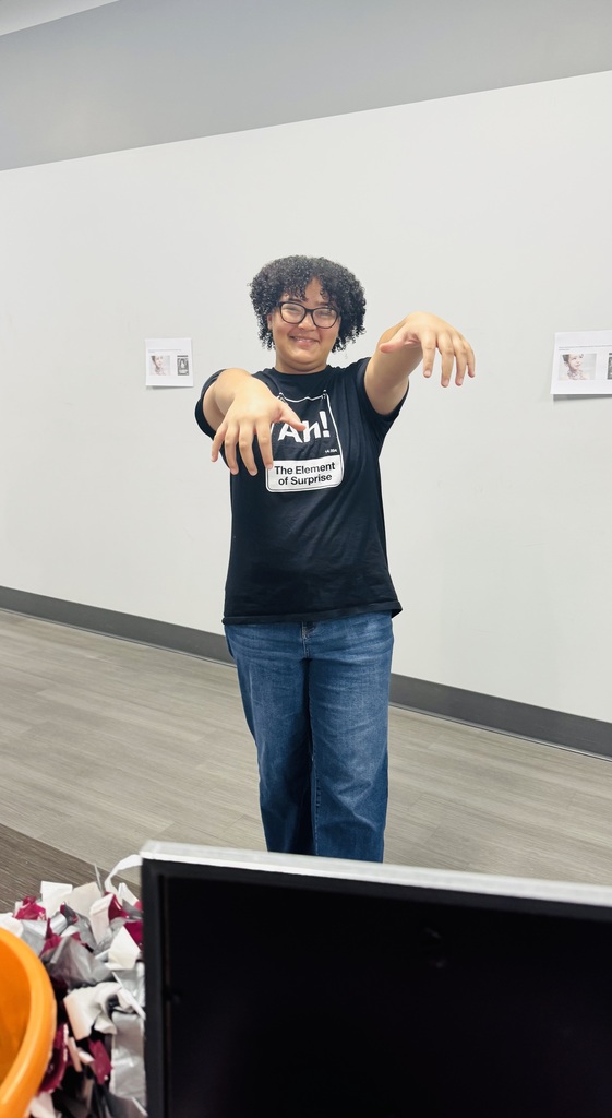 a student in a zombie pose