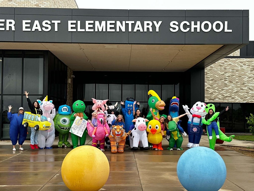 Teachers in inflatable costumes 