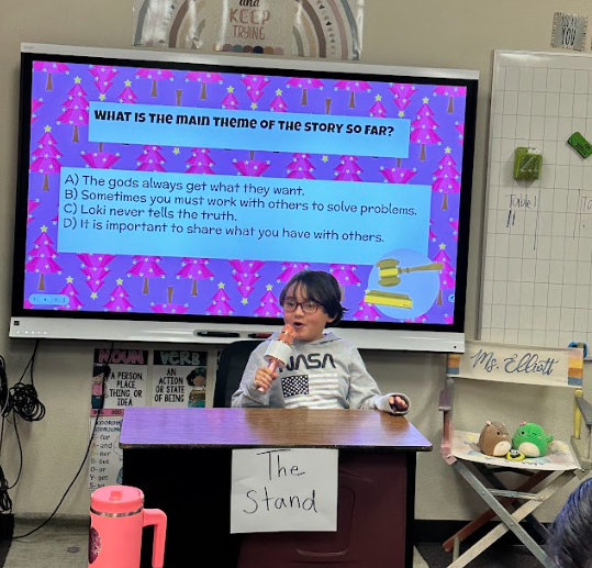 student talking to class