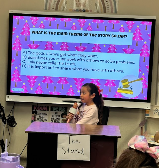 student talking to class