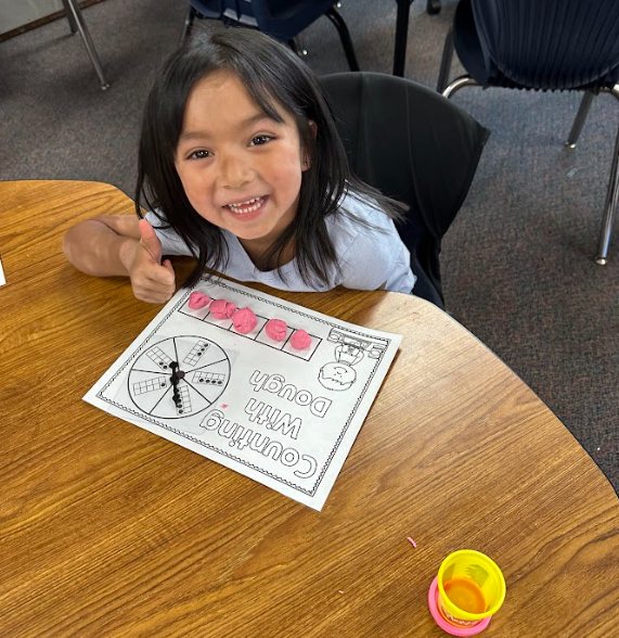 Kindergarten students building numbers