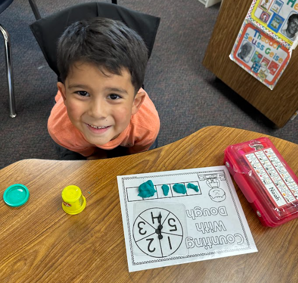 Kindergarten students building numbers