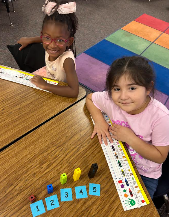 Kindergarten students building numbers