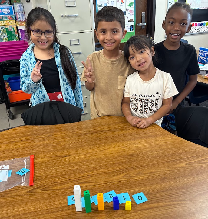 Kindergarten students building numbers