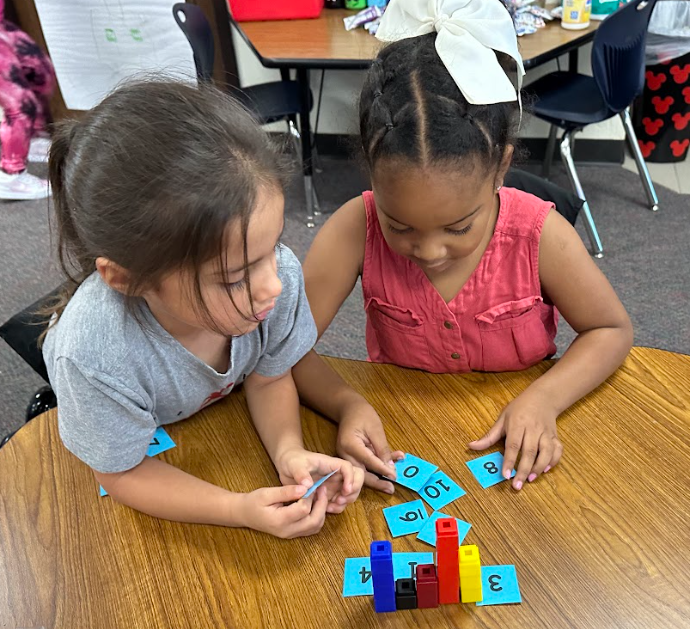 Kindergarten students building numbers