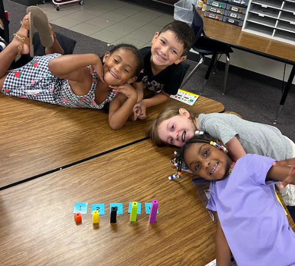 Kindergarten students building numbers