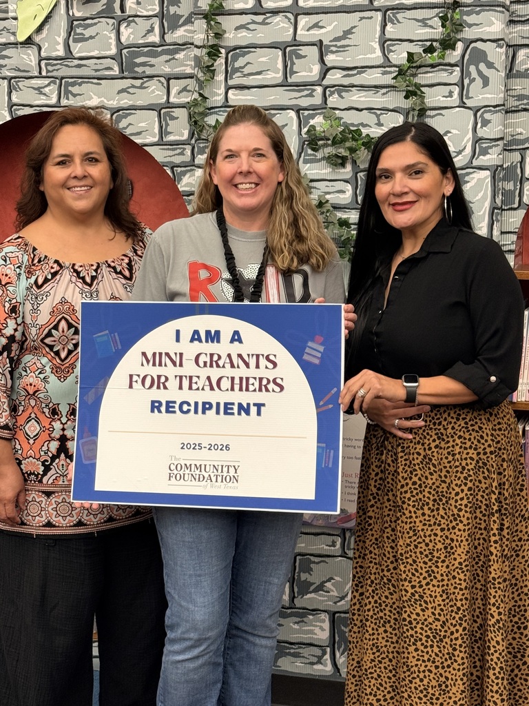 Photo of Librarian receiving an award grant