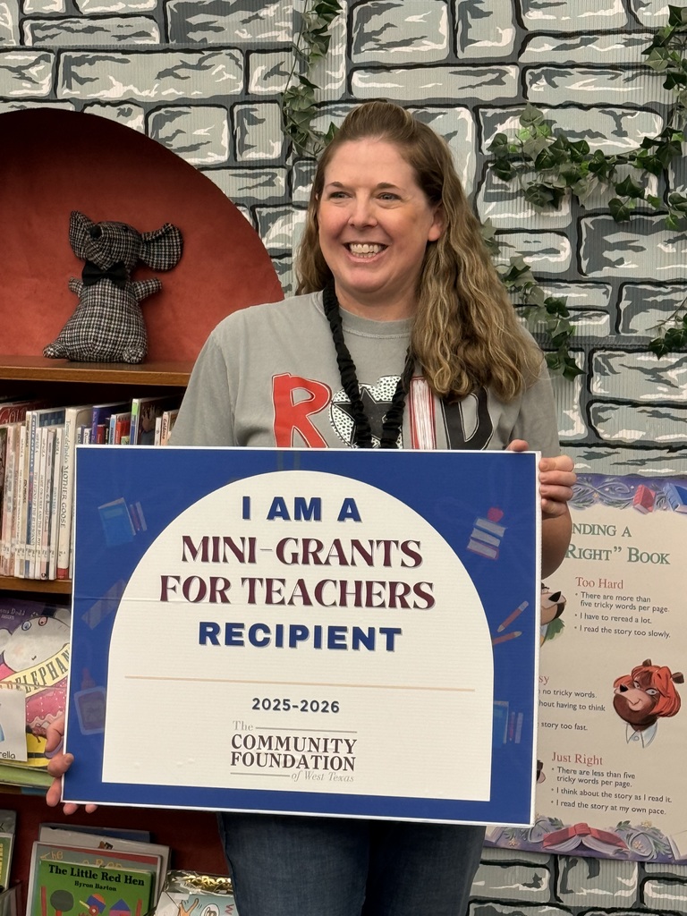 Photo of Librarian receiving an award grant