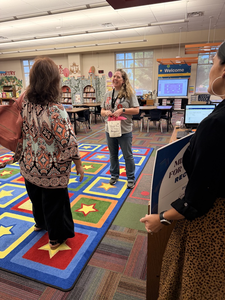 Photo of Librarian receiving an award grant