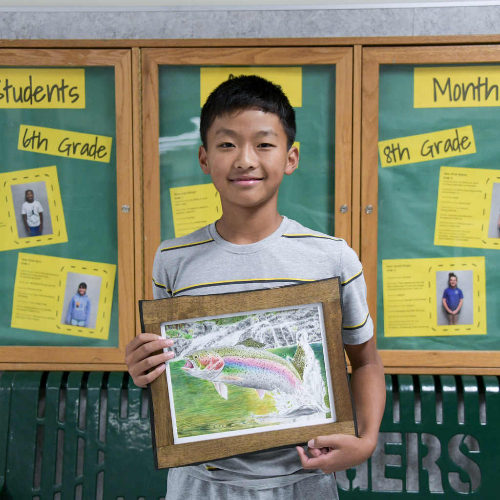 student with artwork