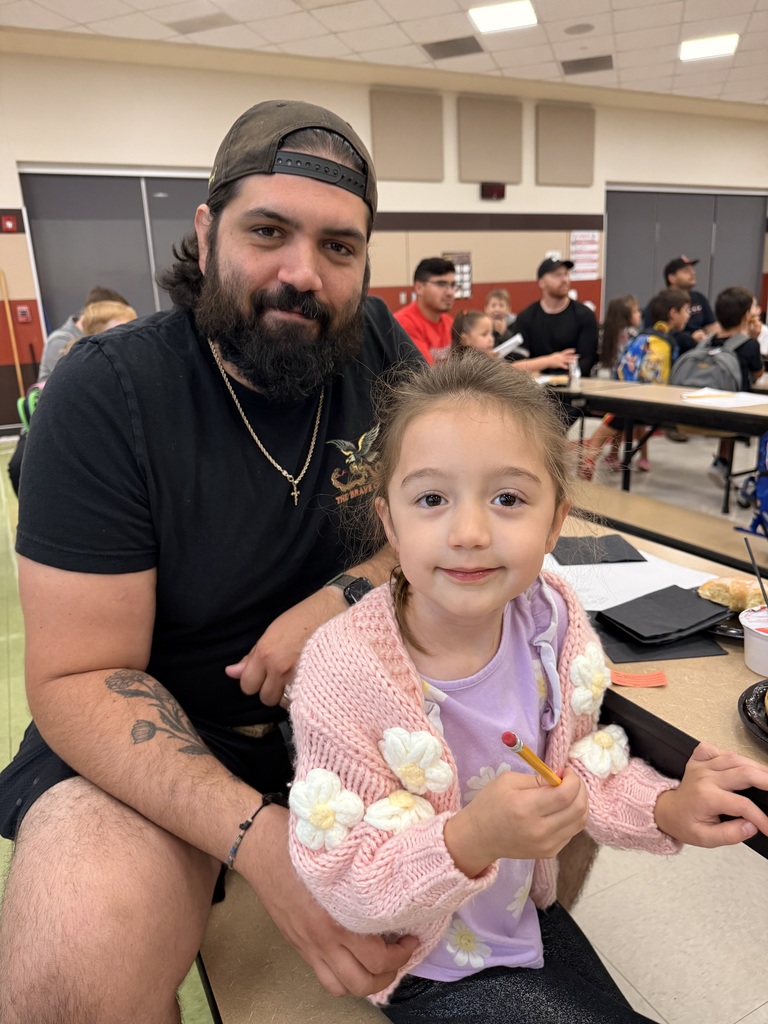 Dad and child at all Pro Dad meeting