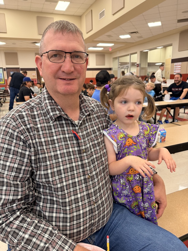 Parent and child at the all pro dad meeting