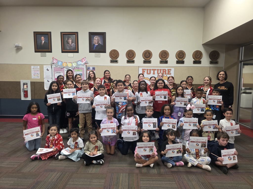 Future Mustang of the Month Students standing holding their certificates