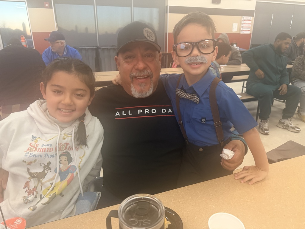 Dad and child at all Pro Dad meeting