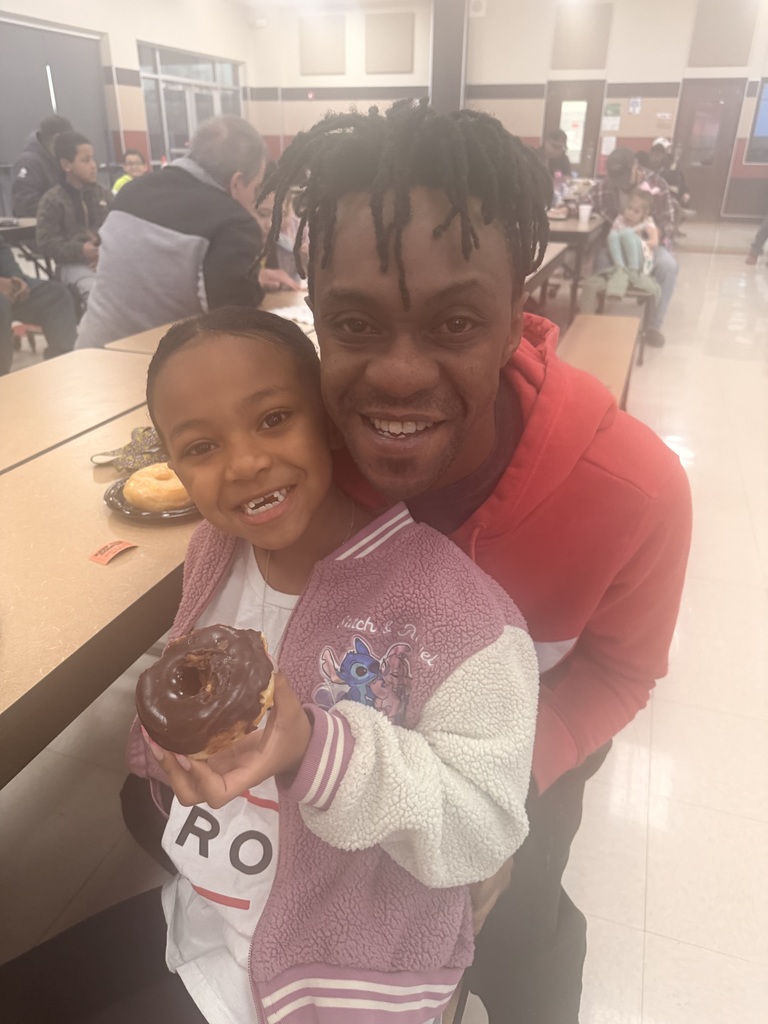 Dad and child at all Pro Dad meeting