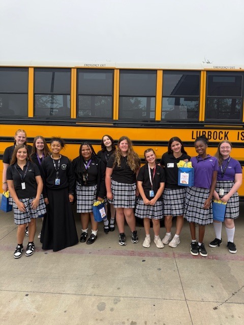 School bus drivers and student council members celebrating Bus Driver Appreciation