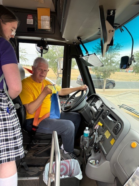 School bus drivers and student council members celebrating Bus Driver Appreciation