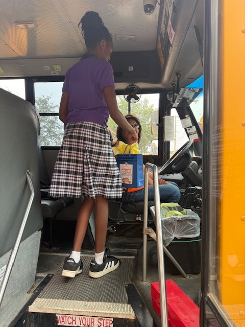 School bus drivers and student council members celebrating Bus Driver Appreciation