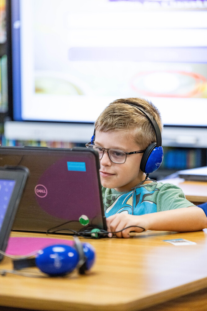 Herty 2nd Grader in Library