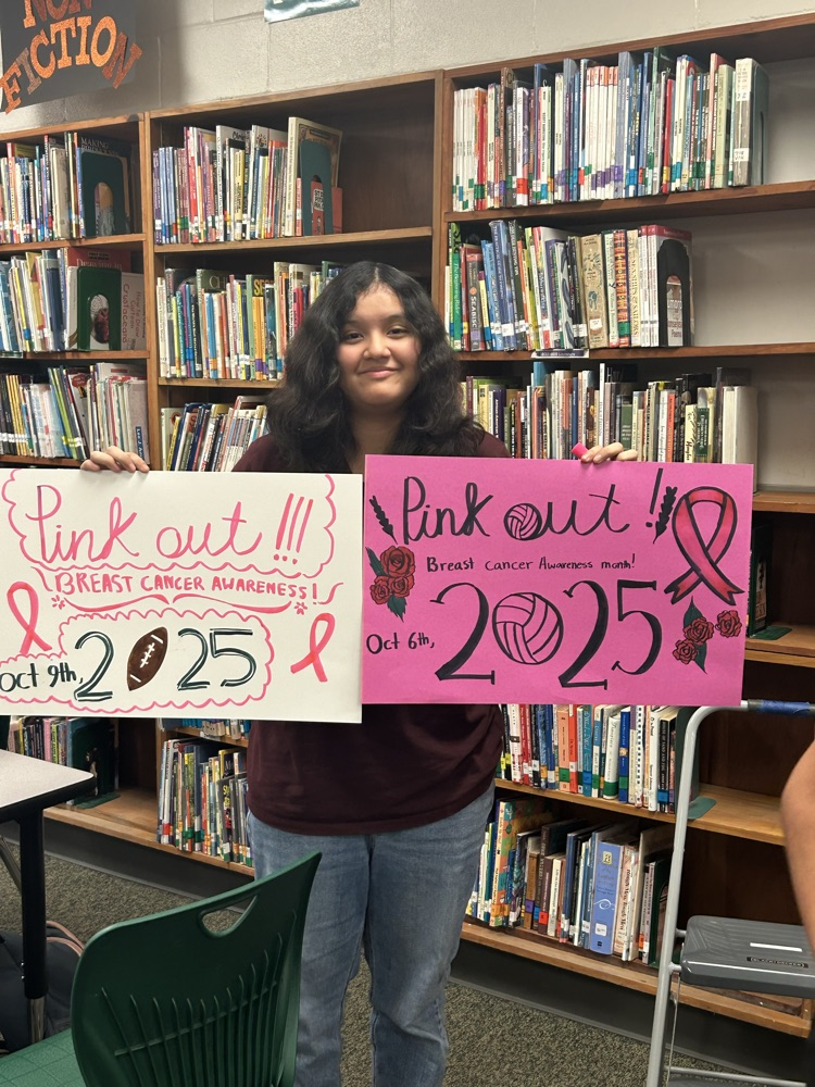 student making pink out items