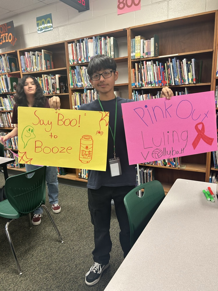 student making pink out items