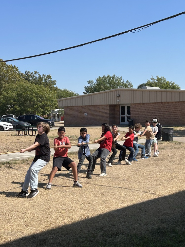 students playing tug of war