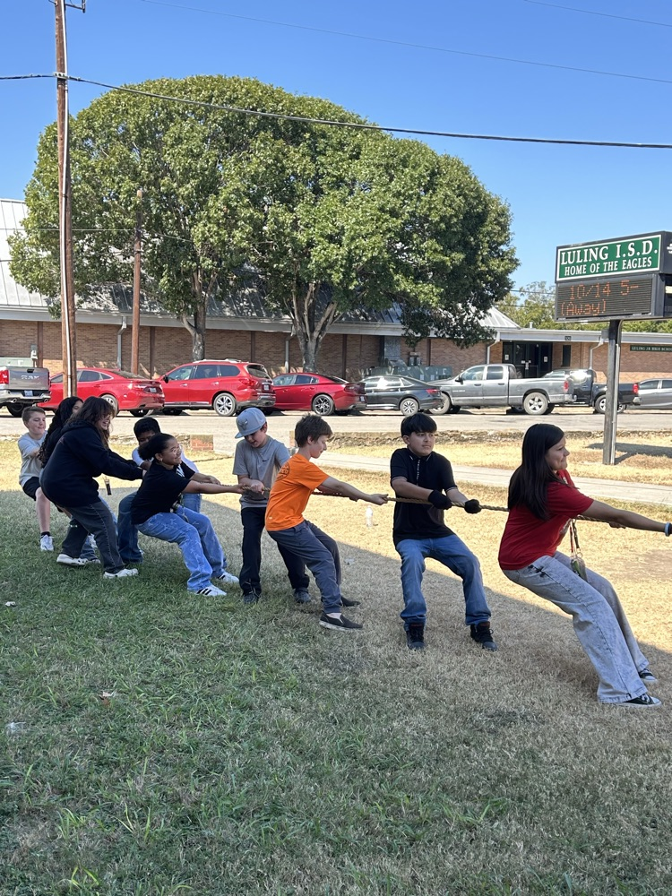 students playing tug of war