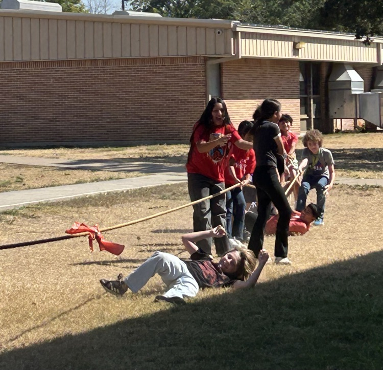 students playing tug of war