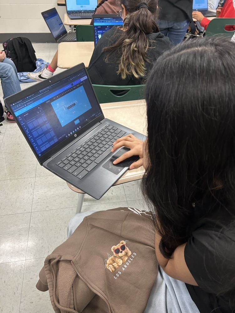 student working on vision board