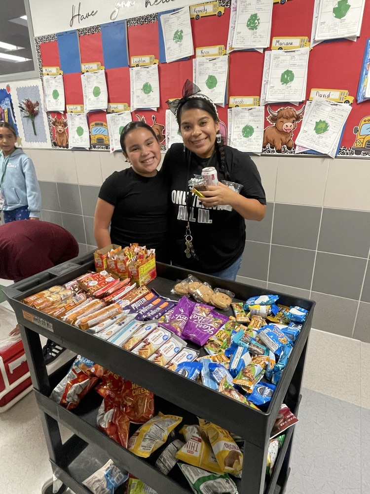 Student Council Officers bringing treats to teachers!