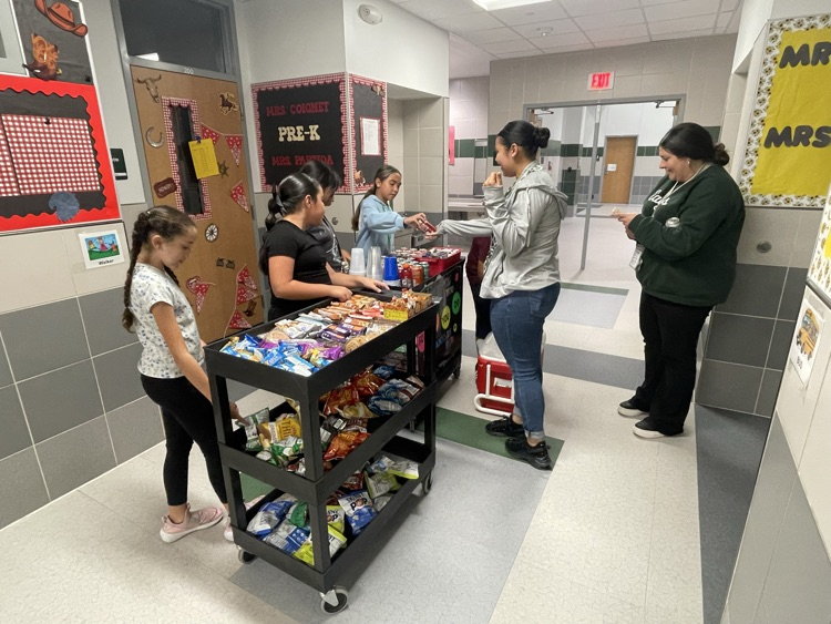 Student Council Officers bringing treats to teachers!