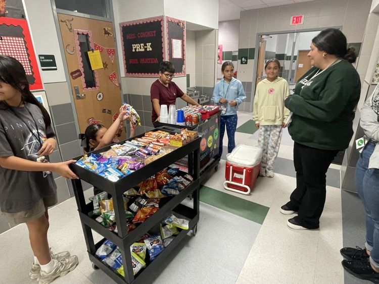 Student Council Officers bringing treats to teachers!