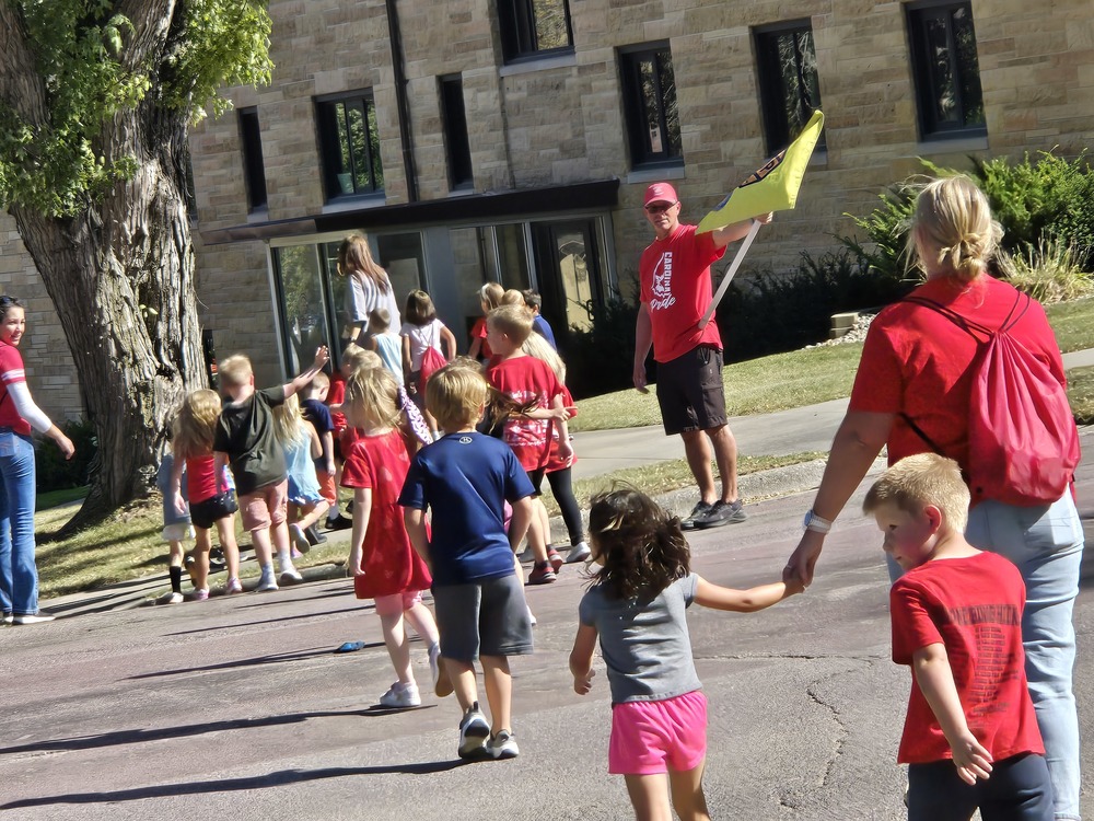 LES Staff making sure that students crossed safely on their way to the evacuation site during last Friday's drill..