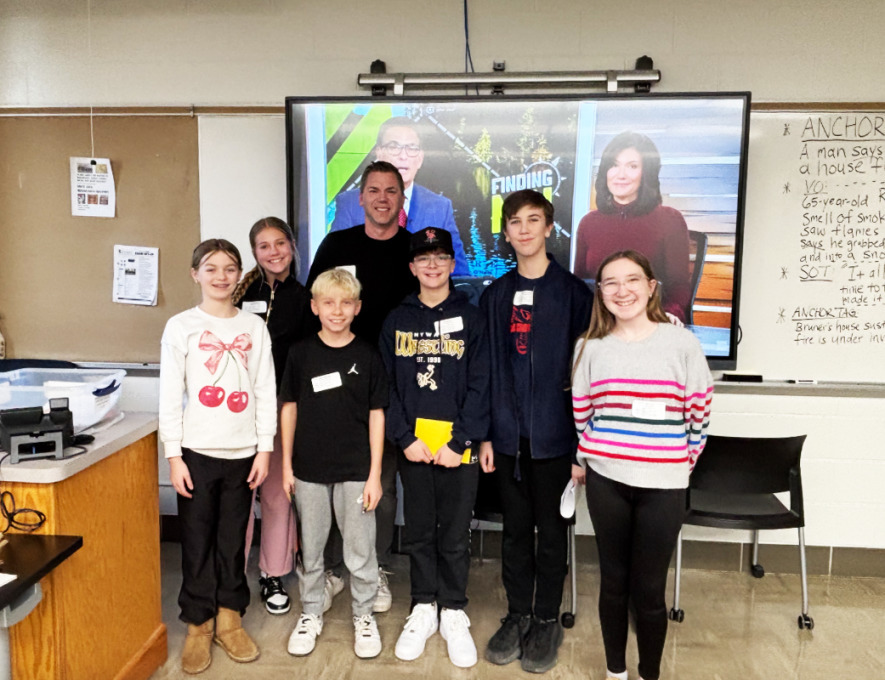 Middle School Students Pose at Conference