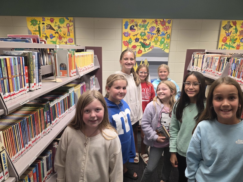 Mrs. Wermager's 5th graders check out some books!