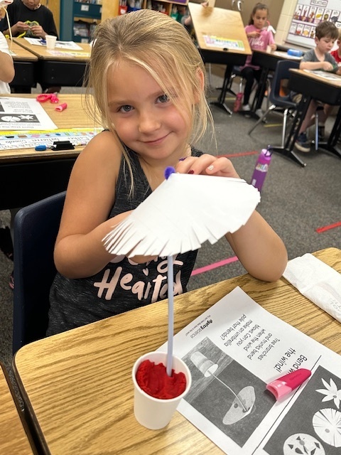 Mrs. Reker's 1st grade class did a science experiment in which we modified a beach umbrella so it was able to stand up to stronger wind. We learned about how trees are able to stand even in windy conditions.