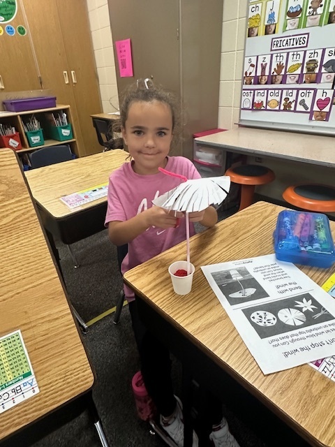 Mrs. Reker's 1st grade class did a science experiment in which we modified a beach umbrella so it was able to stand up to stronger wind. We learned about how trees are able to stand even in windy conditions.