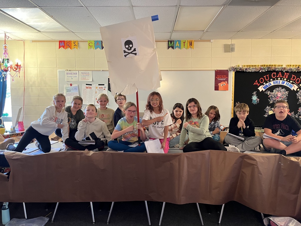 Mrs. Carbonneau's 4th graders finished Unit  two and set sail on their pirate ships:). 🚢  They did a math review based on Battleship with our math standards.  When they finished, they drew their favorite thing about pirates.:)   Some students even took the day to dress up like pirates!